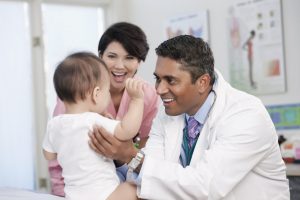OET doctor with child